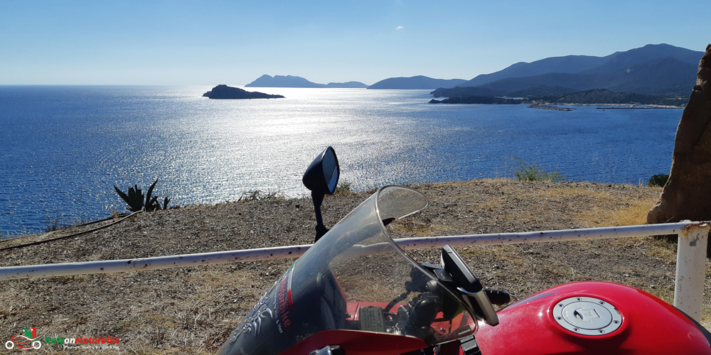 A Honda VFR800 on a coastal road on our Top Class motorcycle tour of Sardinia